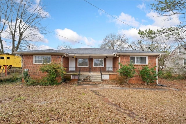 single story home with covered porch