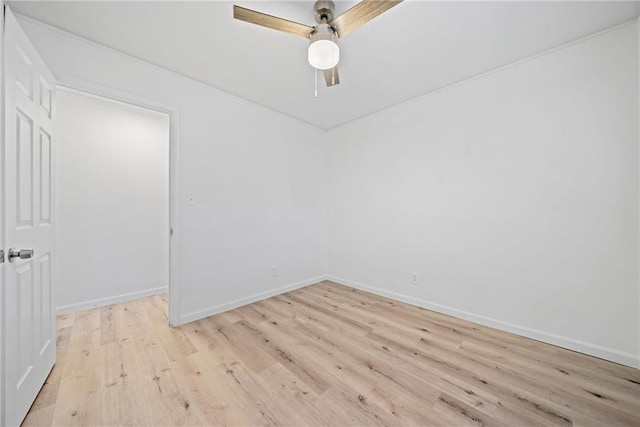 unfurnished room featuring ceiling fan and light wood-type flooring