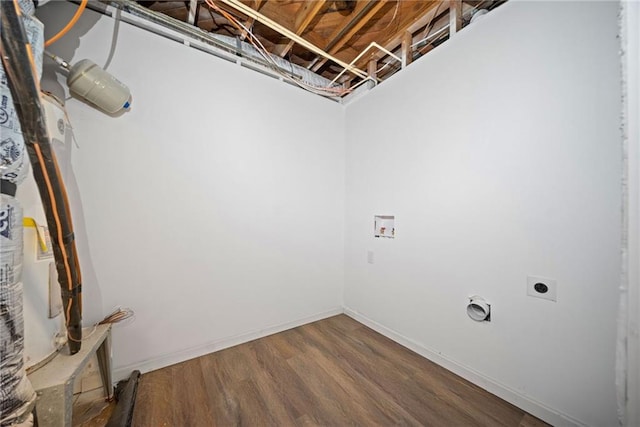 washroom with washer hookup, hardwood / wood-style flooring, and electric dryer hookup