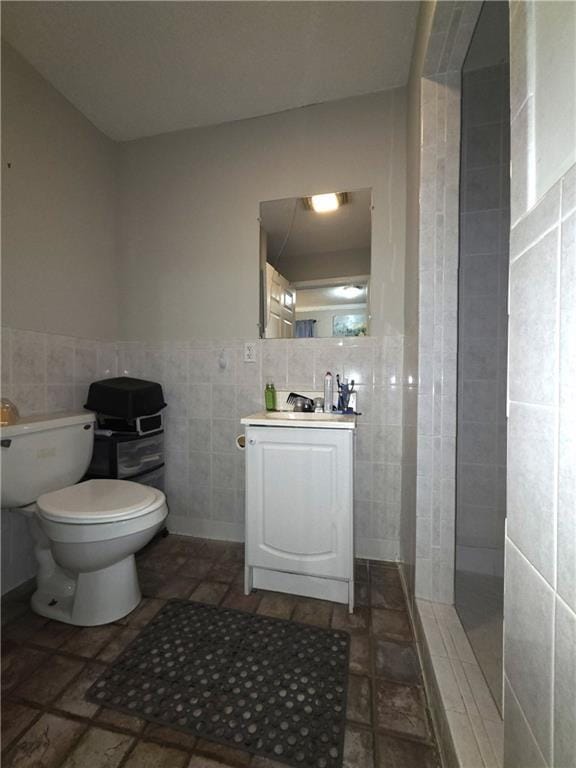 77 Ben W Dr, Cedartown, GA 30125 - bathroom featuring tile walls, vanity, and wainscoting