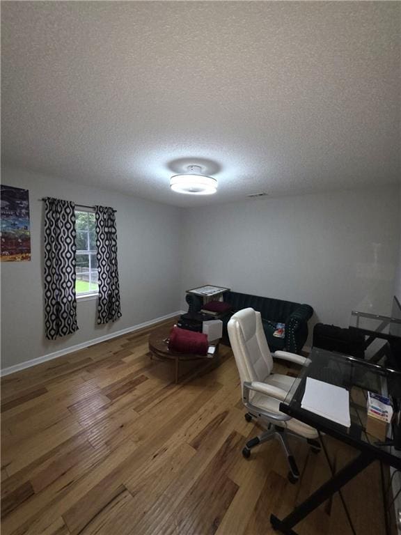77 Ben W Dr, Cedartown, GA 30125 - office area featuring a textured ceiling and wood finished floors