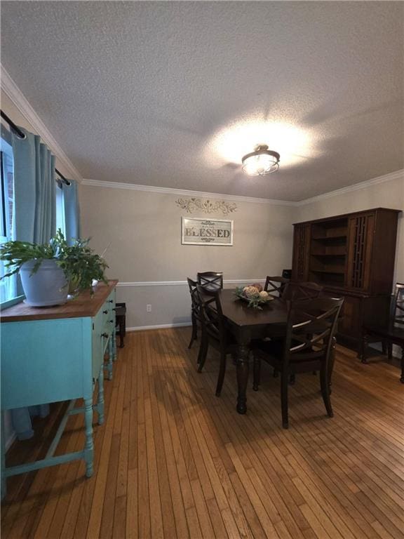 77 Ben W Dr, Cedartown, GA 30125 - dining area featuring hardwood / wood-style floors, a textured ceiling, and ornamental molding