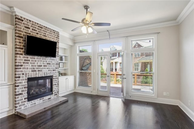 345 Alderwood Ln, Sandy Springs, GA 30328 - unfurnished living room featuring dark wood-style flooring, ornamental molding, a fireplace, a ceiling fan, and baseboards