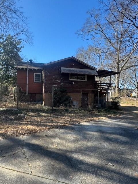 view of home's exterior with driveway