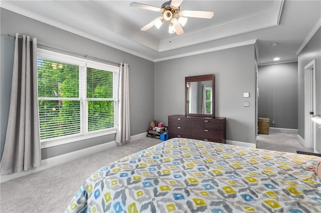 1912 Hosea L Williams Dr NE Unit 1, Atlanta, GA 30317 - carpeted bedroom featuring crown molding, a tray ceiling, baseboards, and a ceiling fan