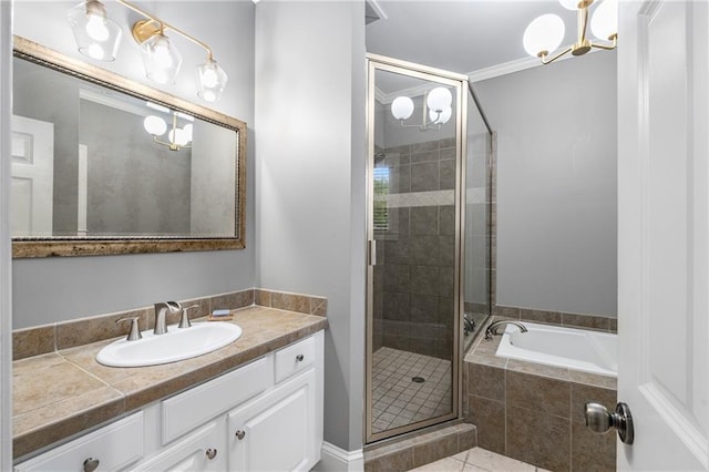 1912 Hosea L Williams Dr NE Unit 1, Atlanta, GA 30317 - bathroom with vanity, a stall shower, a garden tub, tile patterned flooring, and a chandelier