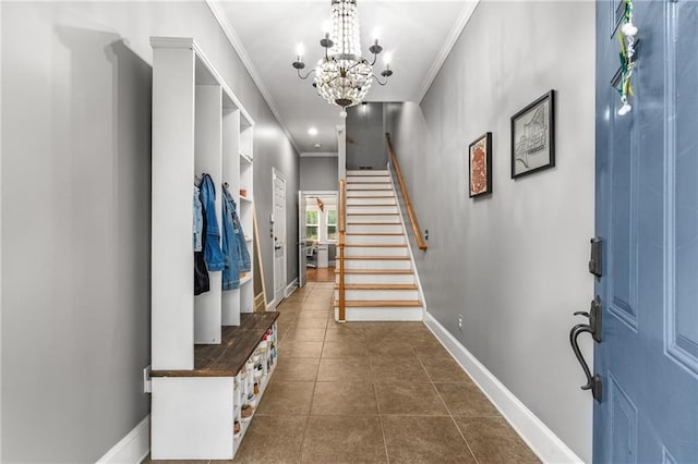 1912 Hosea L Williams Dr NE Unit 1, Atlanta, GA 30317 - entrance foyer featuring crown molding, a chandelier, baseboards, stairway, and dark tile patterned flooring