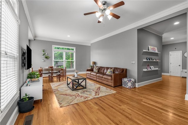 1912 Hosea L Williams Dr NE Unit 1, Atlanta, GA 30317 - living area featuring ornamental molding, wood finished floors, ceiling fan, recessed lighting, and baseboards