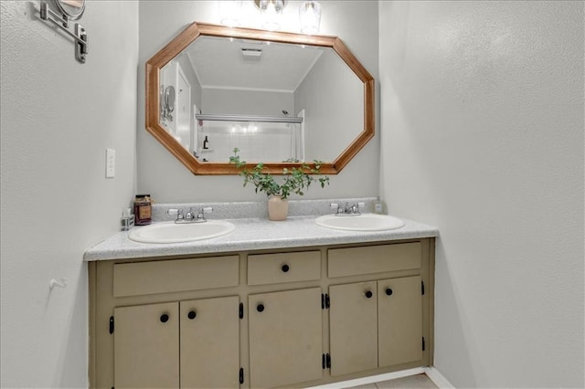 bathroom with walk in shower and vanity