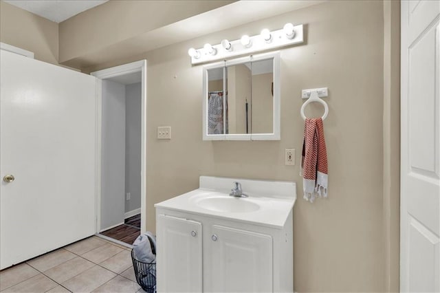 bathroom featuring vanity and tile patterned flooring