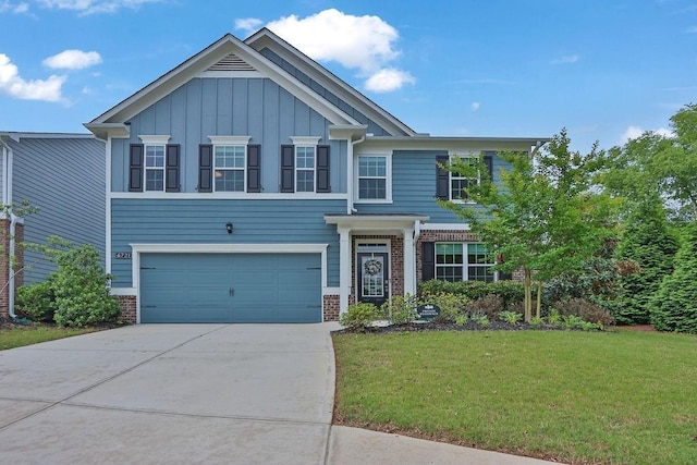 6721 Moondancer Ct, Flowery Branch, GA 30542 - view of front of property featuring brick siding, board and batten siding, driveway, an attached garage, and a front lawn