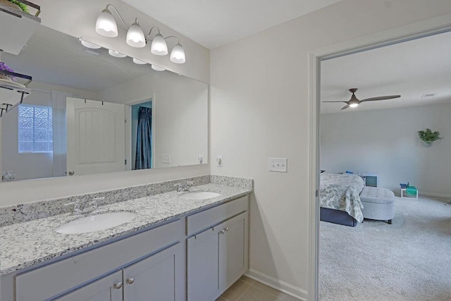 6721 Moondancer Ct, Flowery Branch, GA 30542 - ensuite bathroom featuring baseboards, double vanity, ceiling fan, and tile patterned flooring