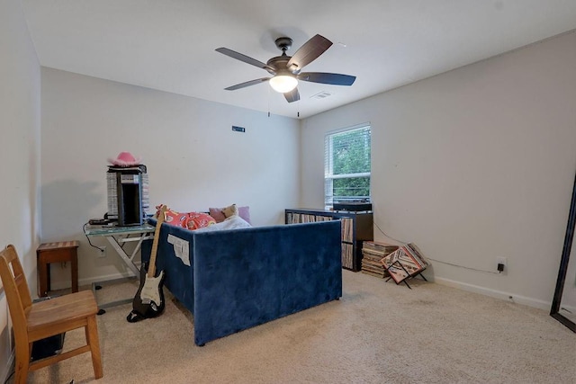 6721 Moondancer Ct, Flowery Branch, GA 30542 - living area featuring a ceiling fan, light carpet, and baseboards