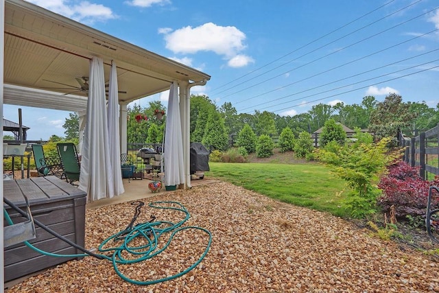 6721 Moondancer Ct, Flowery Branch, GA 30542 - view of yard featuring ceiling fan and a patio