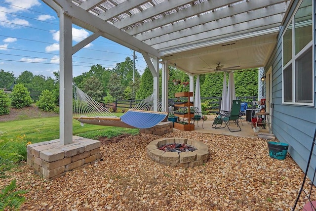 6721 Moondancer Ct, Flowery Branch, GA 30542 - view of yard featuring a fire pit, ceiling fan, and a pergola
