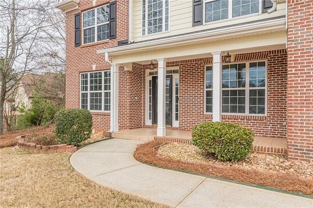 doorway to property with a porch