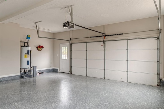 garage with a garage door opener and electric water heater