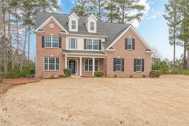 view of front facade with a front lawn