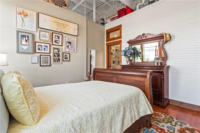 5097 Peachtree Rd Unit I, Atlanta, GA 30341 - bedroom featuring hardwood / wood-style flooring and baseboards