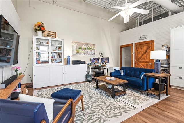 5097 Peachtree Rd Unit I, Atlanta, GA 30341 - living area with a high ceiling, ceiling fan, and wood finished floors