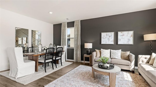 living room featuring dark hardwood / wood-style flooring