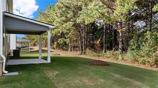 view of yard featuring a patio area and cooling unit