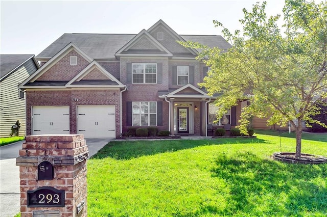 craftsman house featuring a front yard and a garage