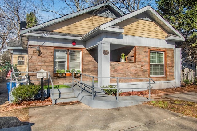 799 Moreland Ave SE, Atlanta, GA 30316 - bungalow-style home featuring stone siding and a porch