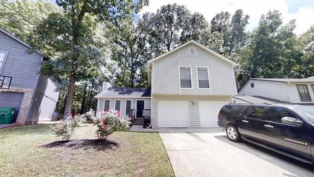 1169 Oaks Pl, Stone Mountain, GA 30083 - traditional-style home featuring driveway, a garage, a chimney, and a front yard
