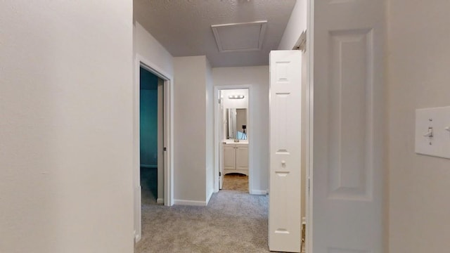 1169 Oaks Pl, Stone Mountain, GA 30083 - hallway with light carpet and baseboards