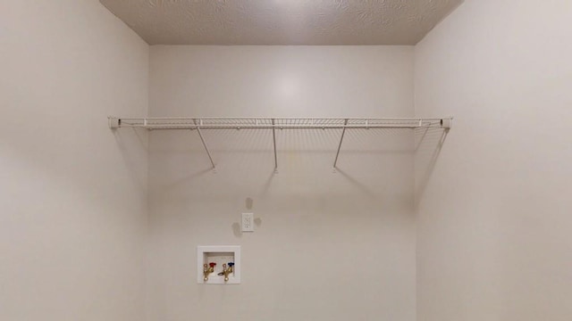 1169 Oaks Pl, Stone Mountain, GA 30083 - laundry area featuring electric dryer hookup and washer hookup