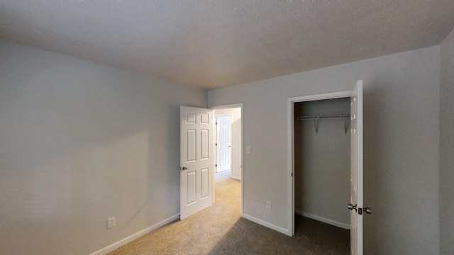 1169 Oaks Pl, Stone Mountain, GA 30083 - unfurnished bedroom with carpet and a closet