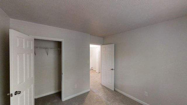 1169 Oaks Pl, Stone Mountain, GA 30083 - unfurnished bedroom featuring carpet and a closet