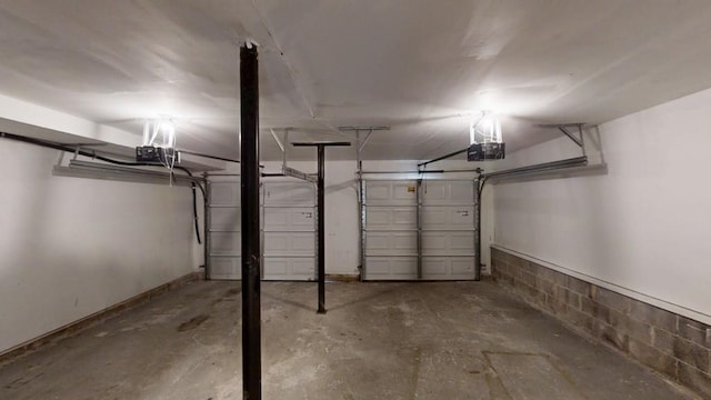 1169 Oaks Pl, Stone Mountain, GA 30083 - garage with a garage door opener