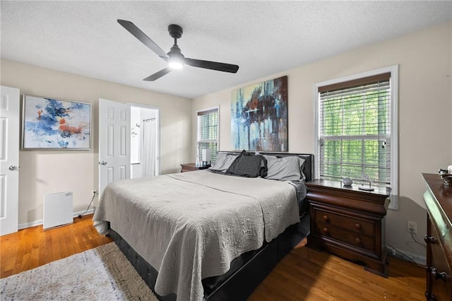 69 Due W Pass, Dallas, GA 30157 - bedroom featuring ceiling fan, wood finished floors, and a textured ceiling