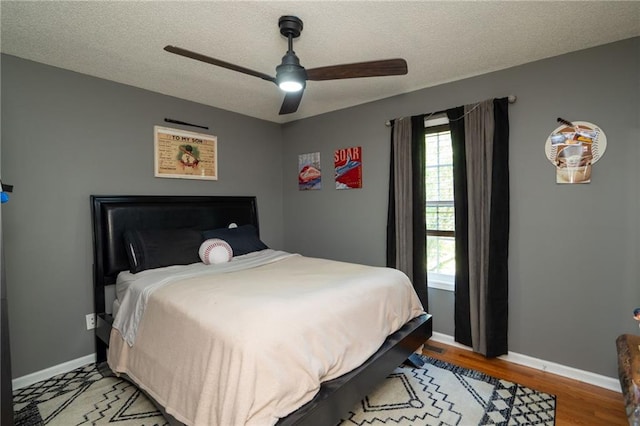 69 Due W Pass, Dallas, GA 30157 - bedroom with a textured ceiling, light wood finished floors, baseboards, and ceiling fan