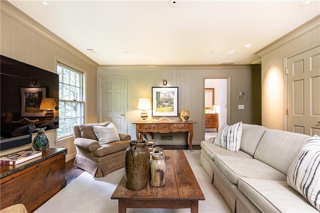 living room with ornamental molding