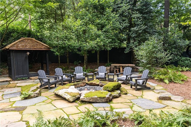 view of patio / terrace featuring a fire pit