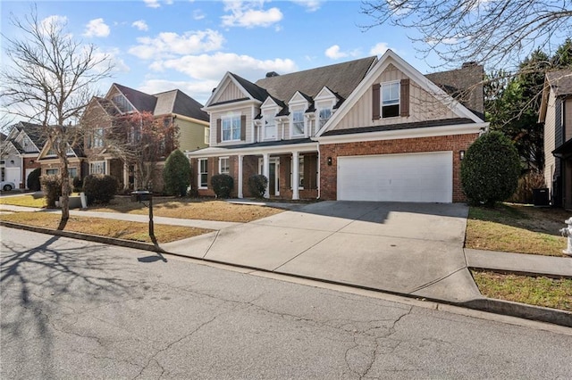 view of front of property with a garage, brick siding, concrete driveway, a residential view, and board and batten siding