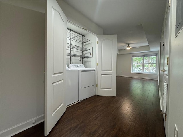 195 14th St NE Unit 303, Atlanta, GA 30309 - laundry area featuring washing machine and clothes dryer, dark wood-type flooring, and a ceiling fan