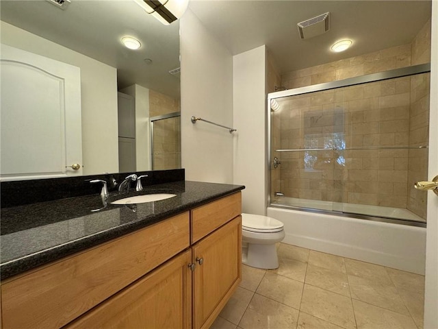 195 14th St NE Unit 303, Atlanta, GA 30309 - bathroom featuring vanity, shower / bath combination with glass door, and tile patterned flooring