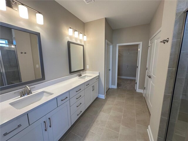 carpeted bedroom with visible vents and baseboards