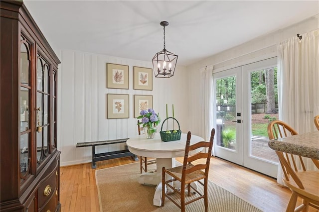 3357 Pretty Branch Dr SE, Smyrna, GA 30080 - dining room featuring french doors, light wood finished floors, and a chandelier