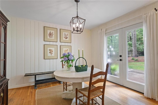 3357 Pretty Branch Dr SE, Smyrna, GA 30080 - dining area with french doors, light wood-type flooring, and a chandelier