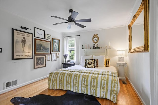 3357 Pretty Branch Dr SE, Smyrna, GA 30080 - bedroom with wood finished floors, baseboards, crown molding, and a ceiling fan