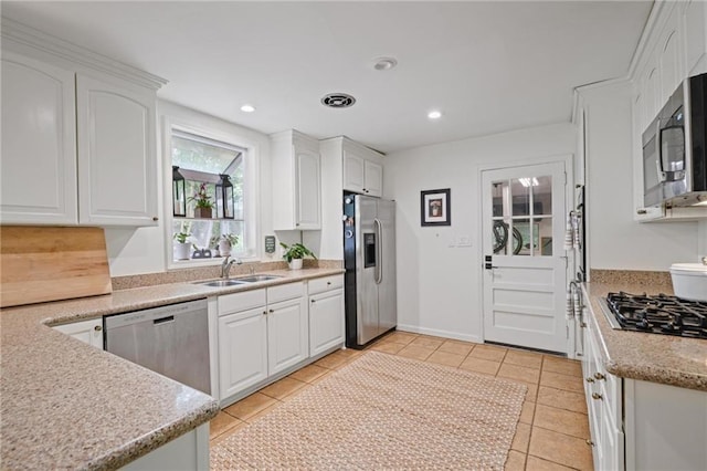 3357 Pretty Branch Dr SE, Smyrna, GA 30080 - kitchen featuring appliances with stainless steel finishes, white cabinetry, and recessed lighting