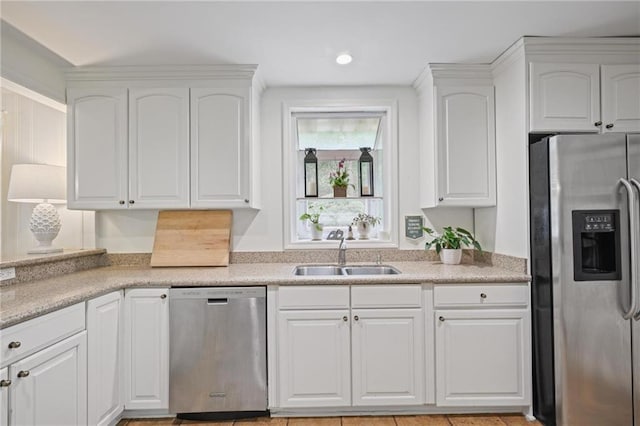 3357 Pretty Branch Dr SE, Smyrna, GA 30080 - kitchen featuring appliances with stainless steel finishes, a sink, white cabinetry, and recessed lighting