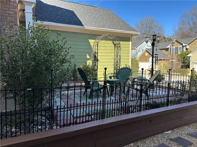 deck featuring a patio and fence