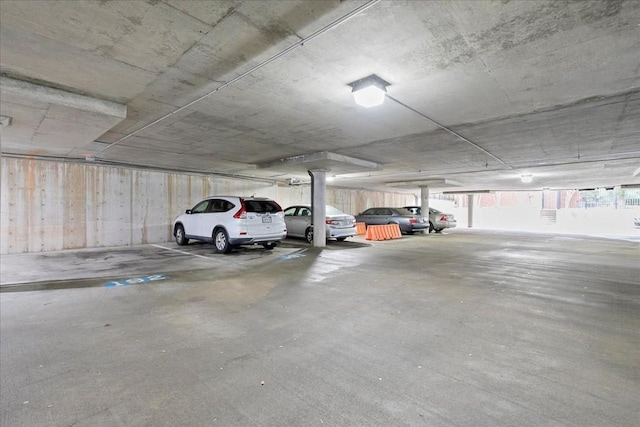 garage featuring a carport