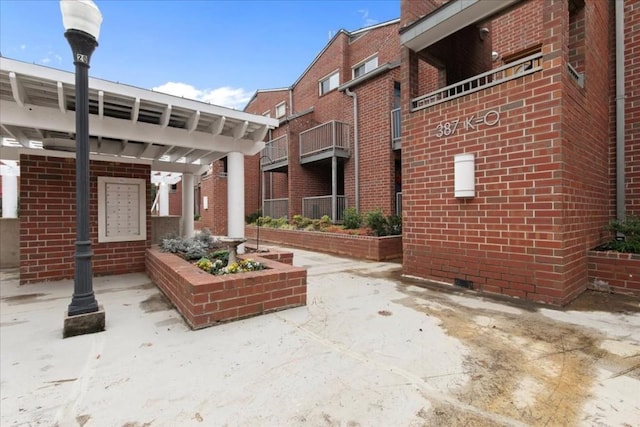 view of patio / terrace with a balcony